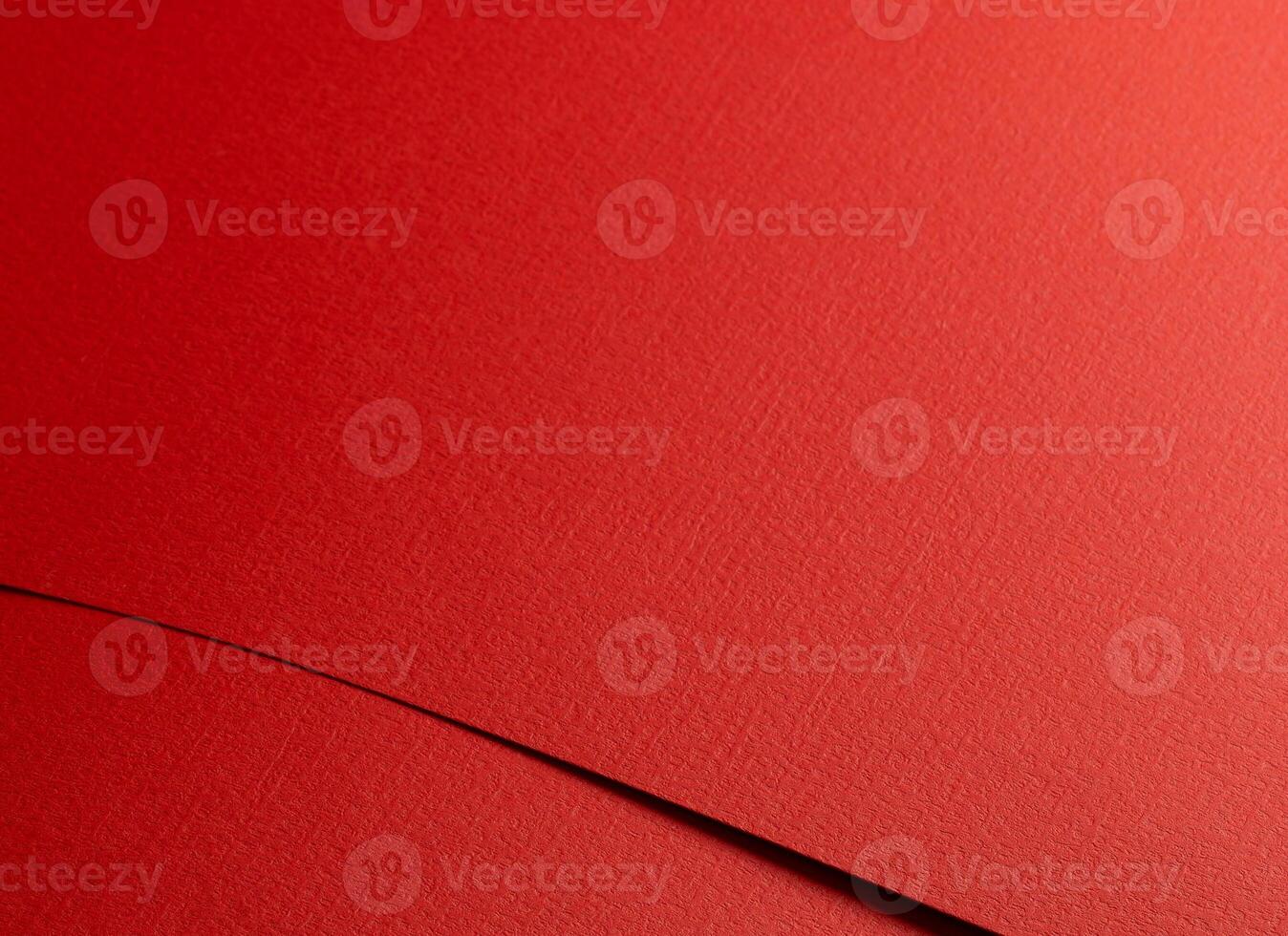 Red paper texture with fire red and scarlet tones, bold geometric lines and textured surface, clean photo