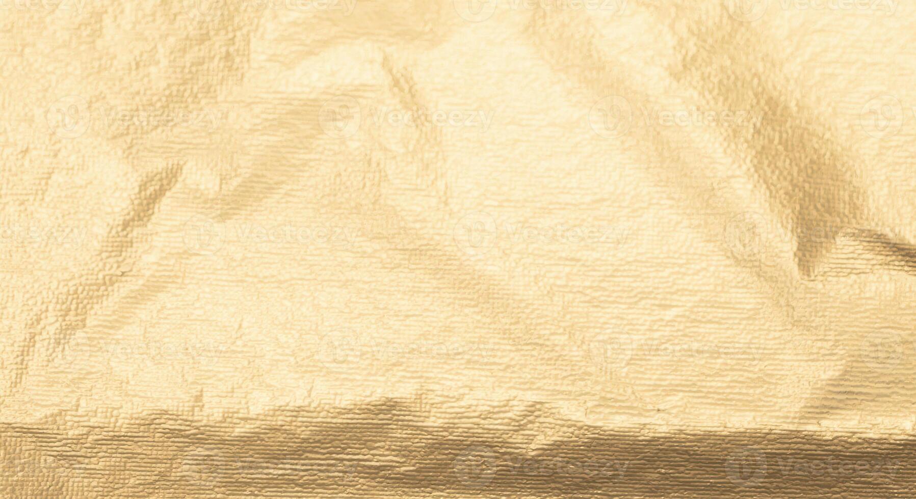 Golden foil textured folds with a pearlescent, glossy finish. Gilded, crumpled paper creating a photo
