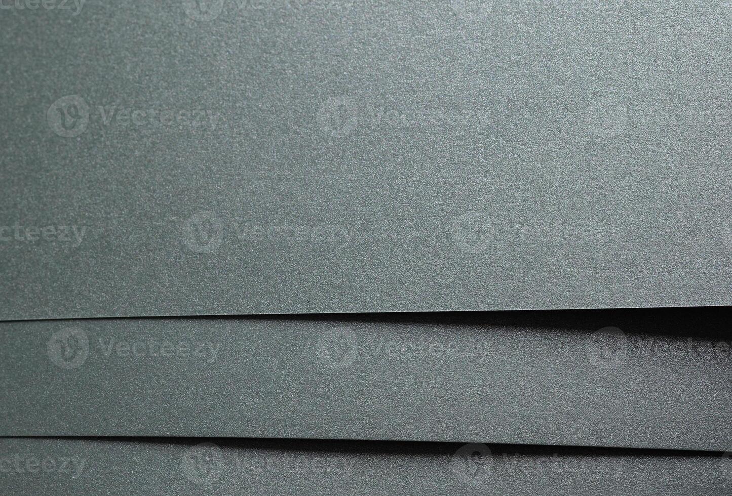 Paper texture with sage green tone, glossy shimmering surface and glitter overlay, elegant layered photo