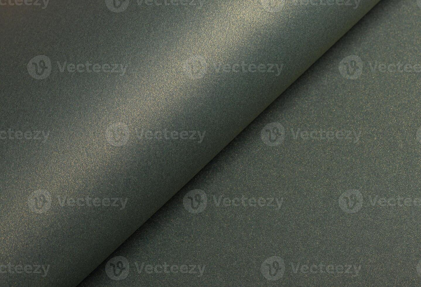 Paper texture with warm yellowish tone, glossy surface and pearlescent shimmer, stylish designer photo