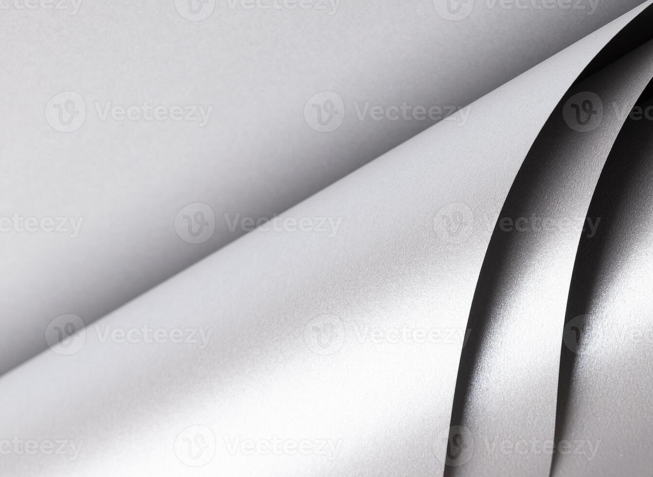 Paper texture with sleek silver and platinum tones, glossy pearlescent surface with shimmering wave photo