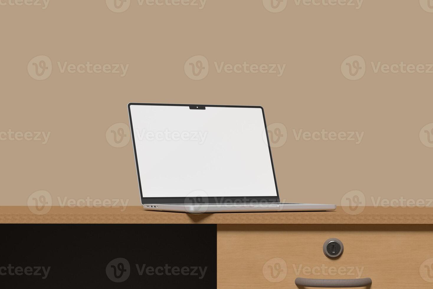 Laptop on a desk with a brown background photo