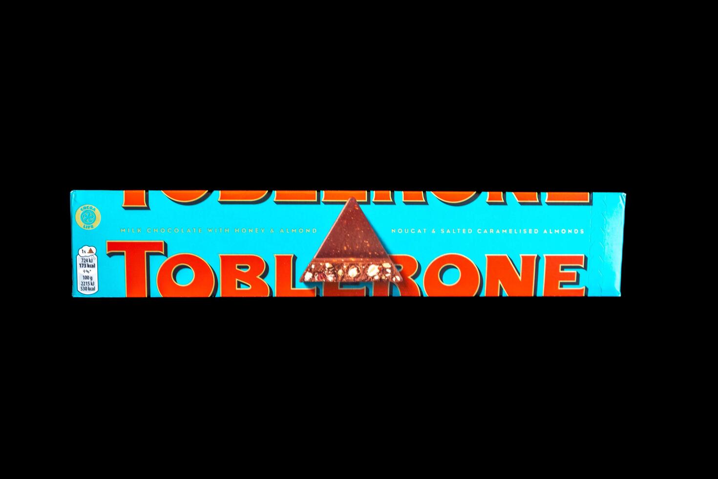 Brazil, May 10, 2025. Toblerone chocolate with salt and almonds and chestnuts black photo