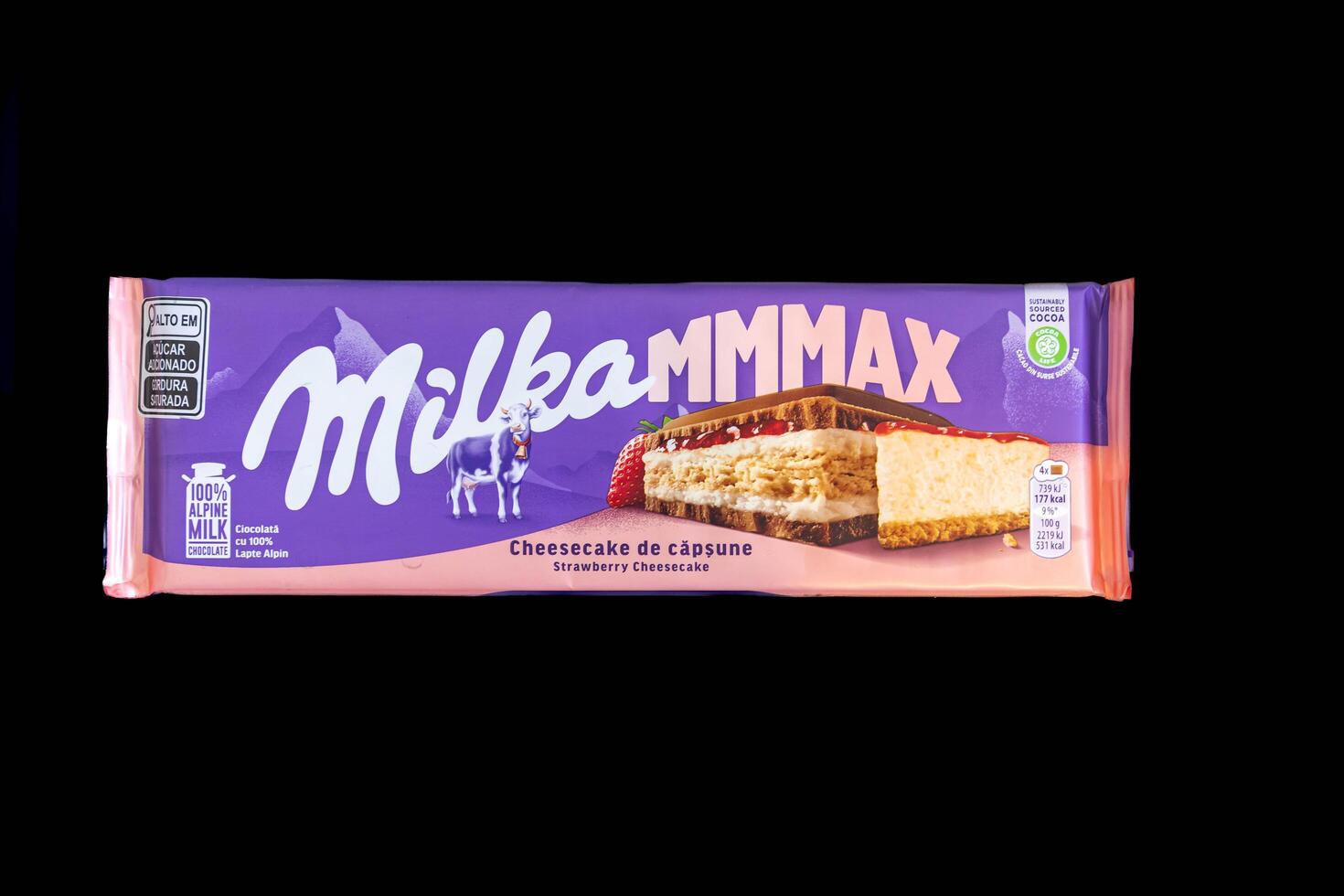 Brazil, May 3, 2025. Milka Mmmax Swiss Chocolate, isolated on a plain background and in top view black photo