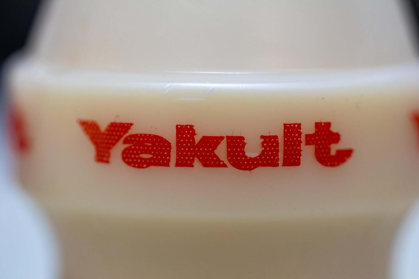Brazil, May 10, 2025. Traditional fermented milk drink with live lactobacillus casei shirota natural healthy probiotic macro photo