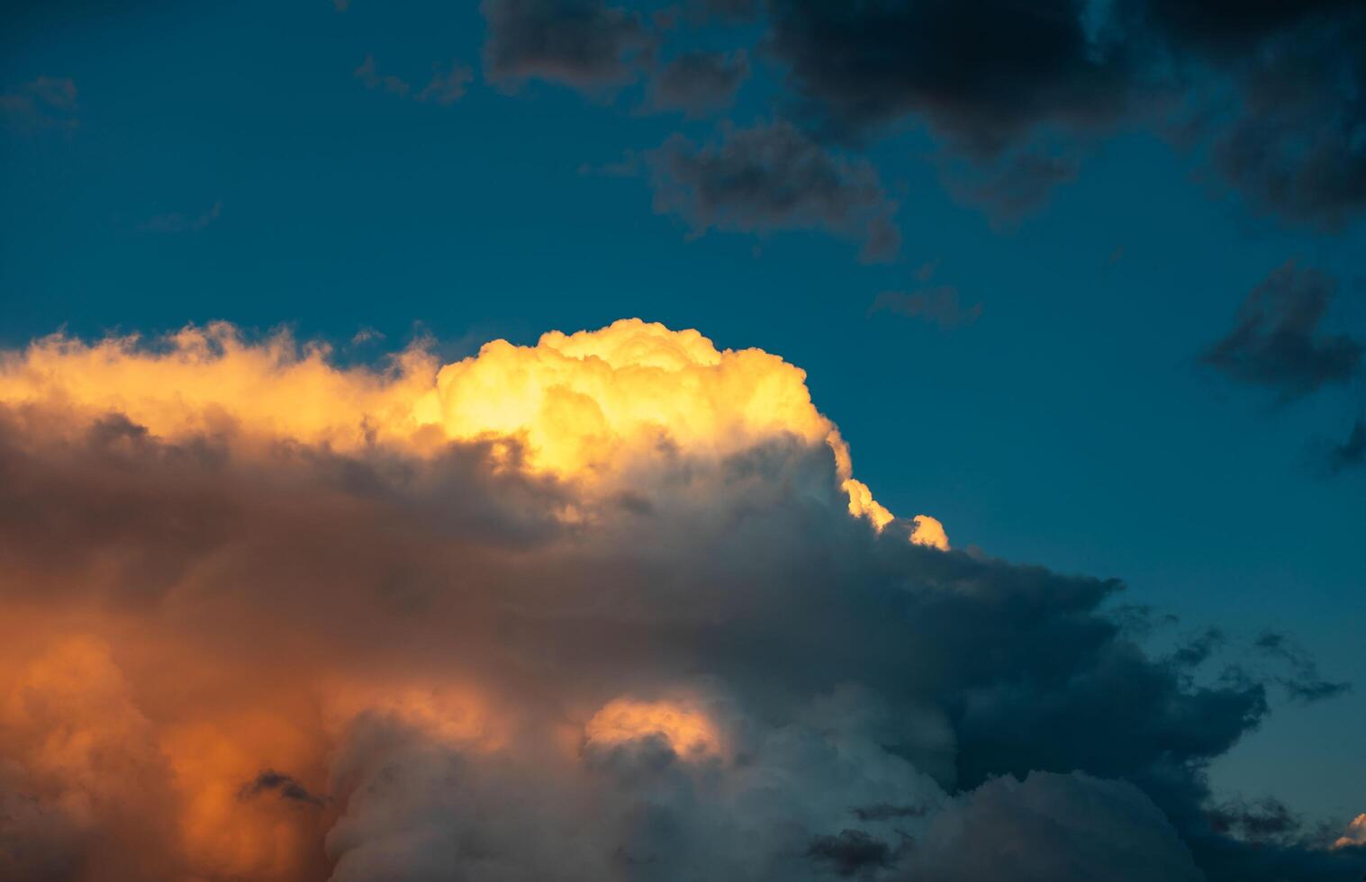 Multicolored sky with clouds and dramatic lighting.. photo