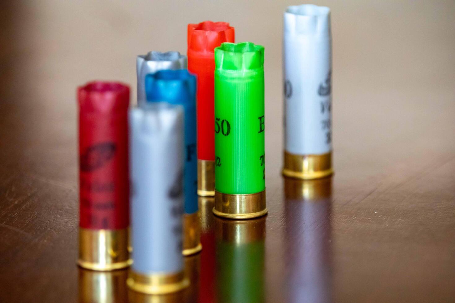Brazil, May 10, 2025. 12 gauge shotgun shells of various types and colors photo