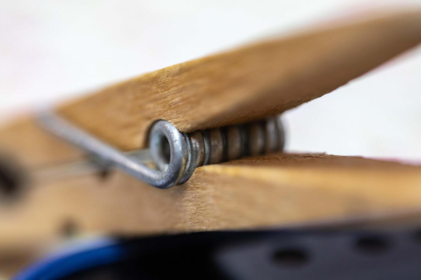 Wooden clothespin or clamp in macro detail photo