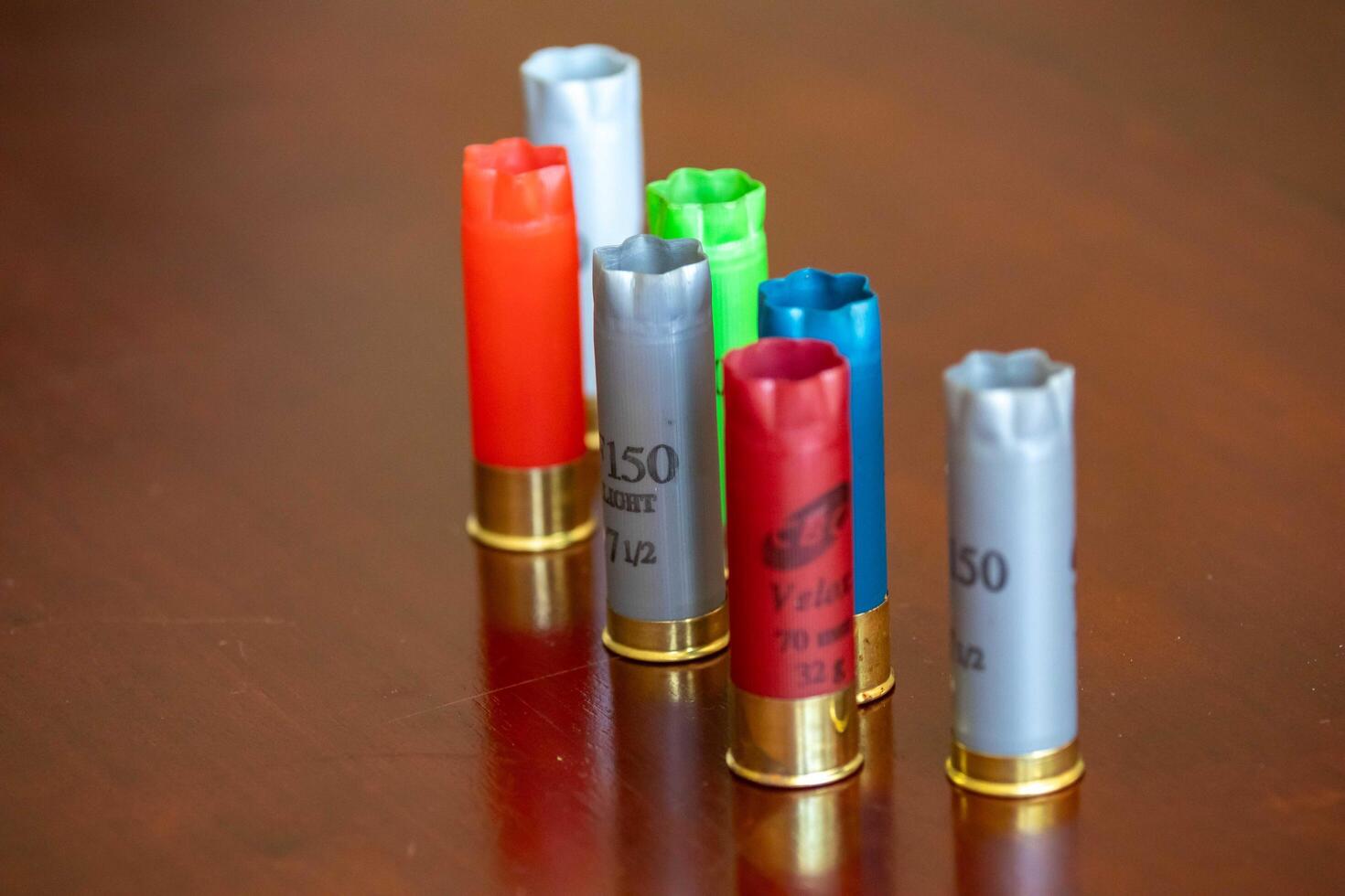 Brazil, May 10, 2025. 12 gauge shotgun shells of various types and colors macro details photo