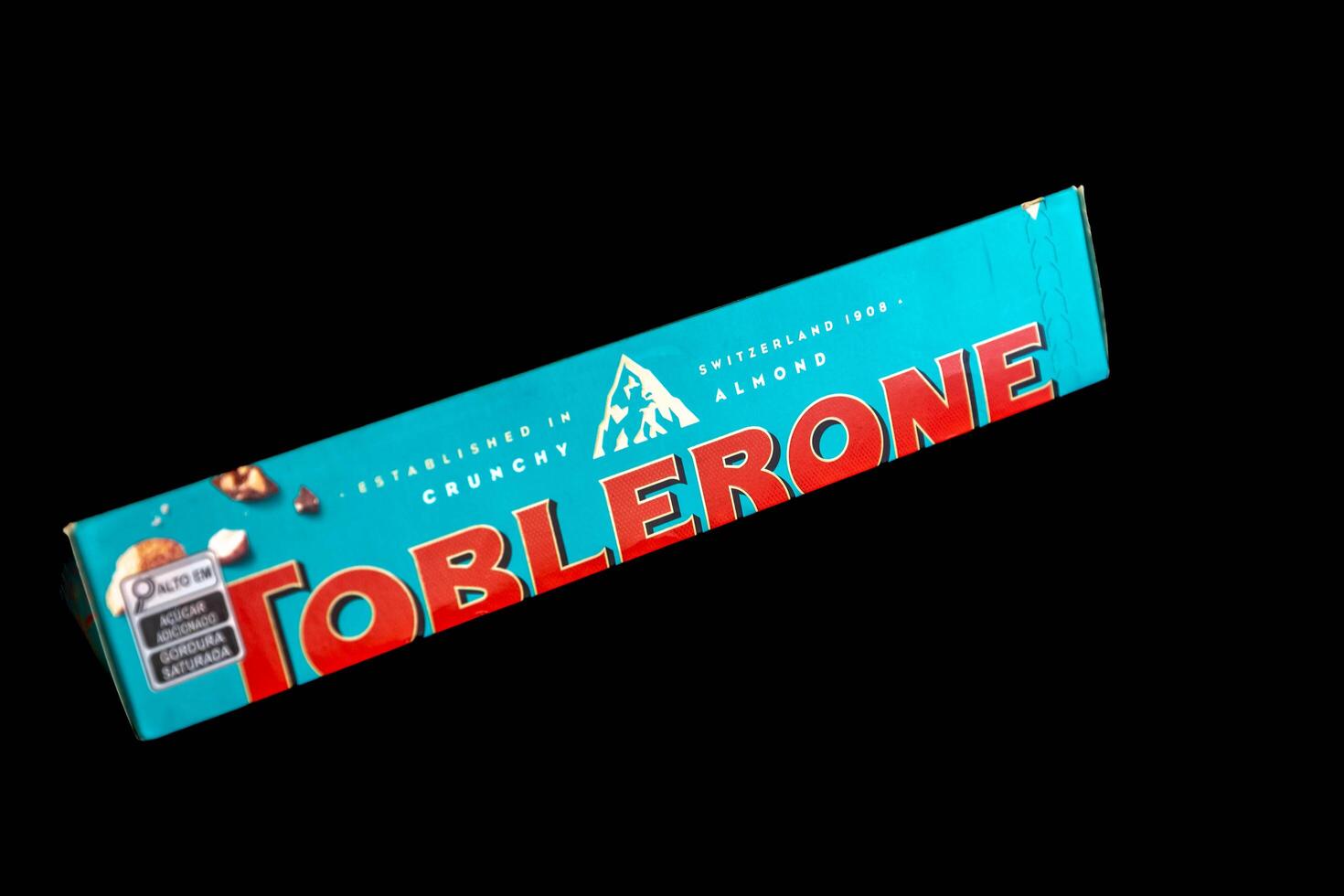 Brazil, May 10, 2025. Toblerone chocolate with salt and almonds and chestnuts isolated photo