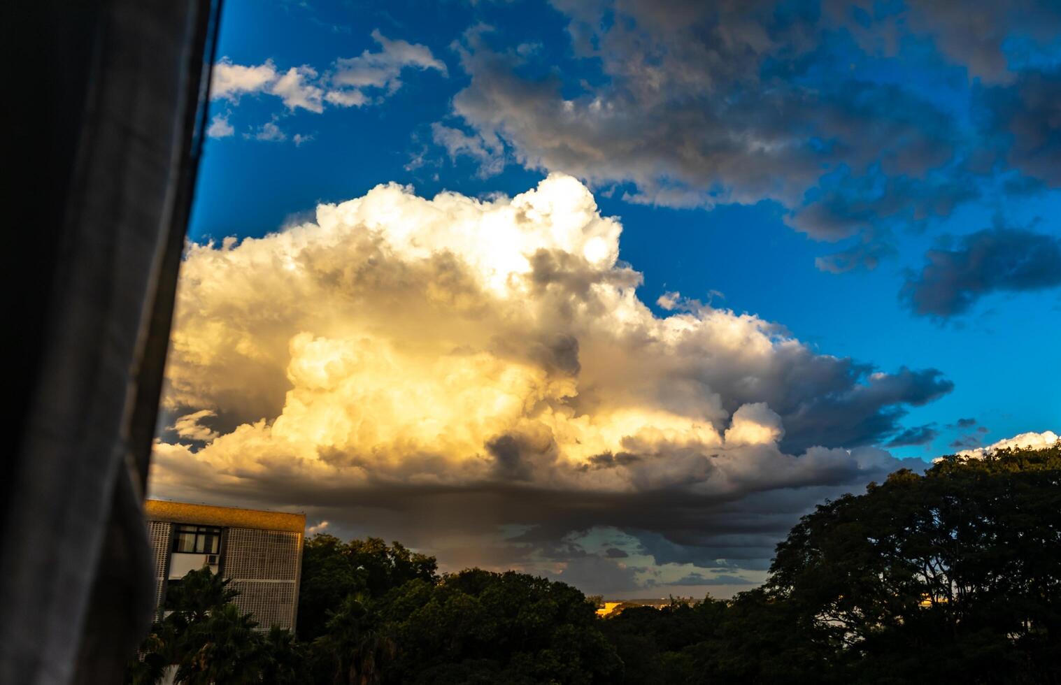 Multicolored sky with clouds and dramatic lighting courtain photo