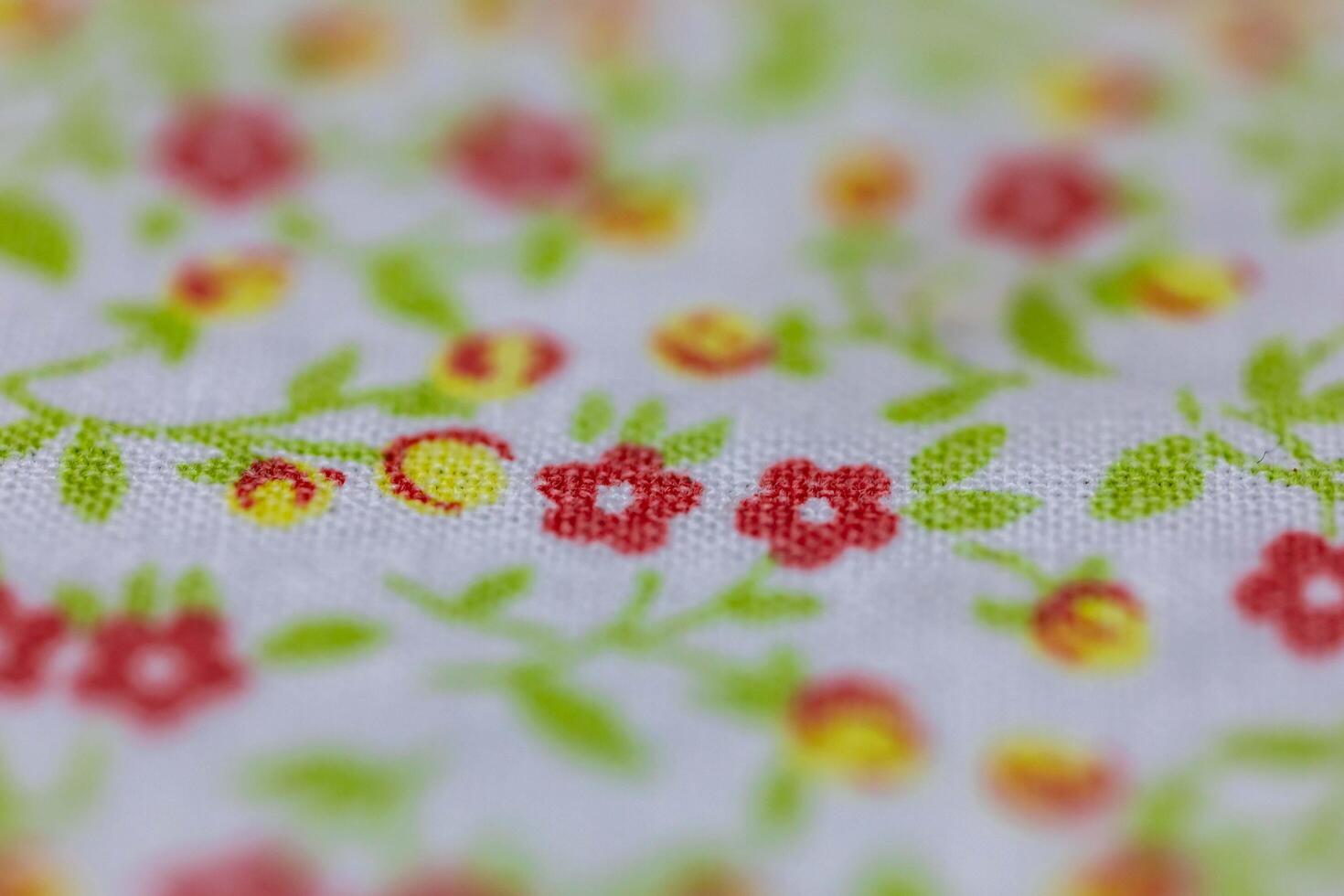 Full screen background of fabric with vintage print and soft texture selective focus photo