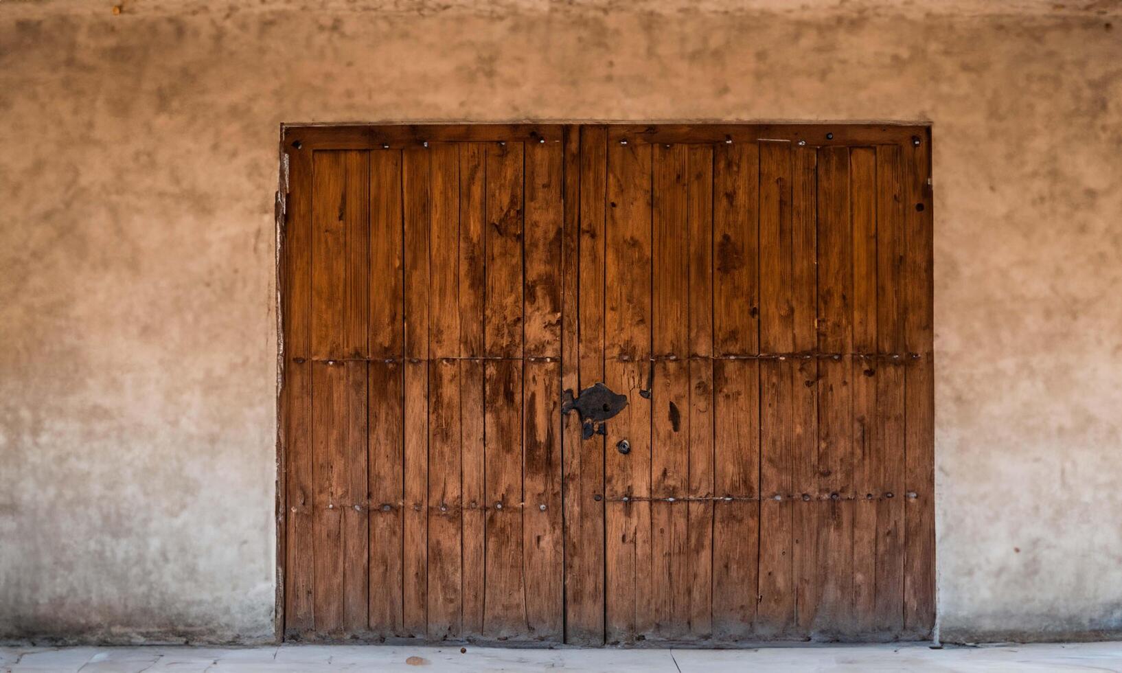 Rustic antique wooden door in full frame with free space for text photo