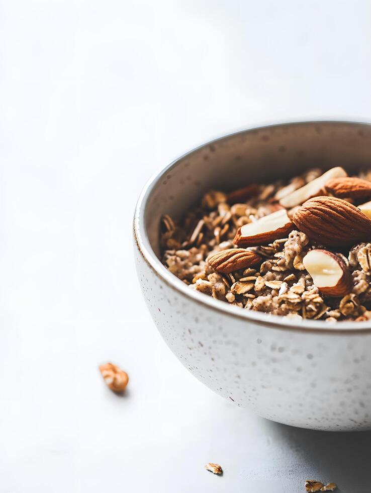Granola with almonds and nuts in a bowl photo