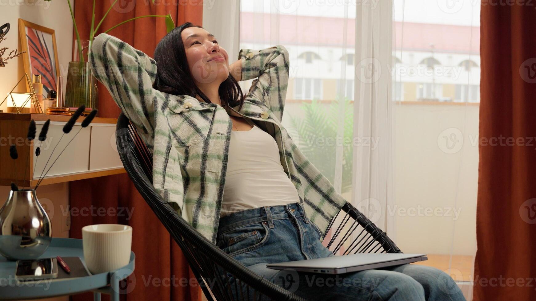 Happy Asian Korean woman working computer finish female businesswoman girl business home indoor employer complete online end close laptop relaxed rest smiling office put hands behind head entrepreneur photo