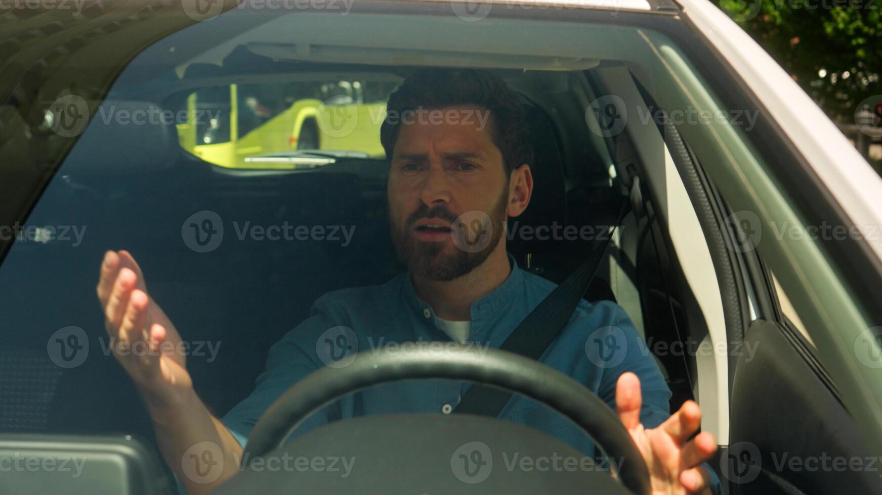 Angry dissatisfied man Caucasian man guy businessman male driver shout roadway traffic jam problem accident driving own car auto road destination complain displeased trouble drive automobile in city photo
