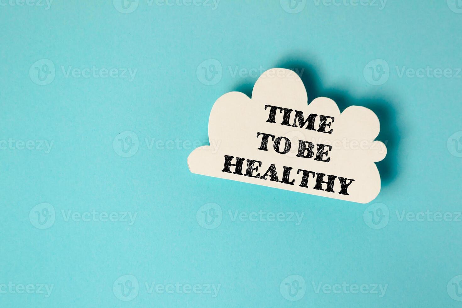 A cloud with the words Time to be healthy written on it photo