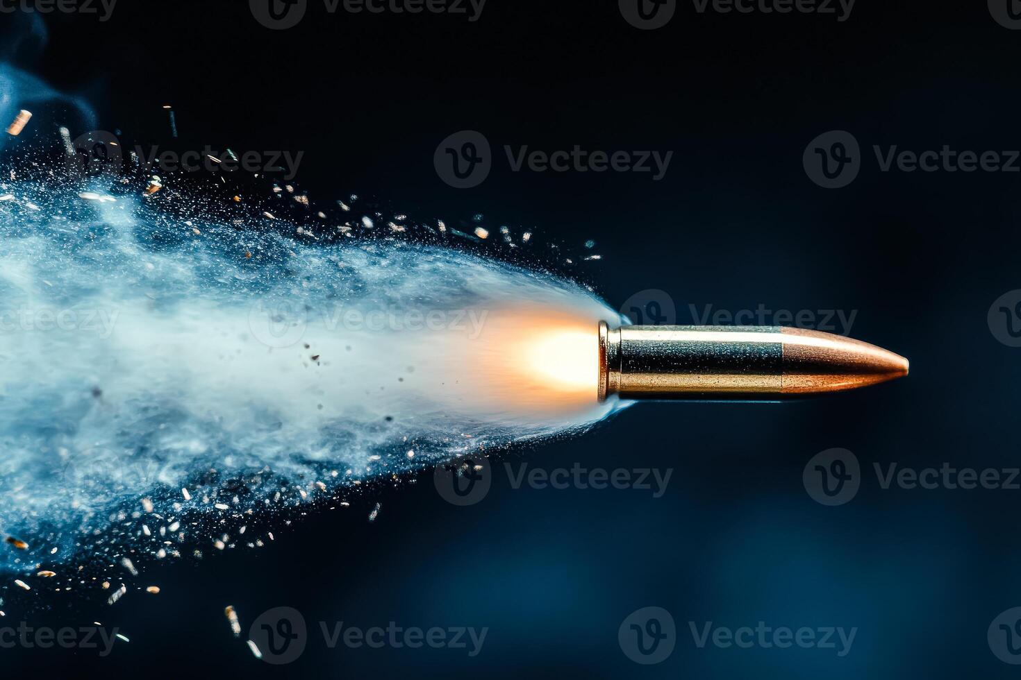 Bullet is shot out of a gun, leaving a trail of smoke and debris behind it photo