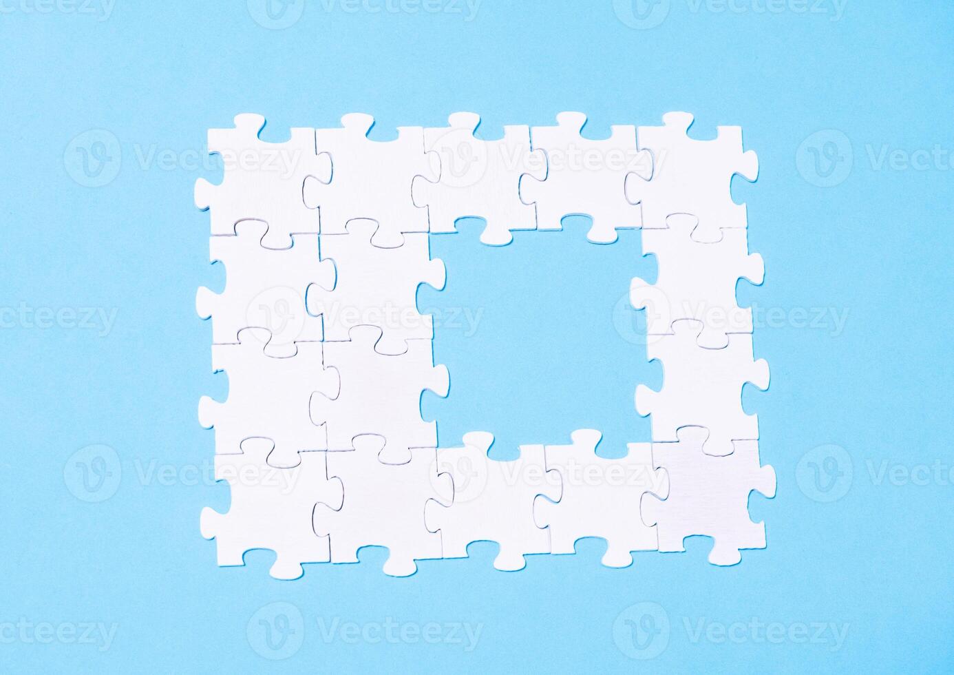 Puzzle piece is missing from a puzzle photo