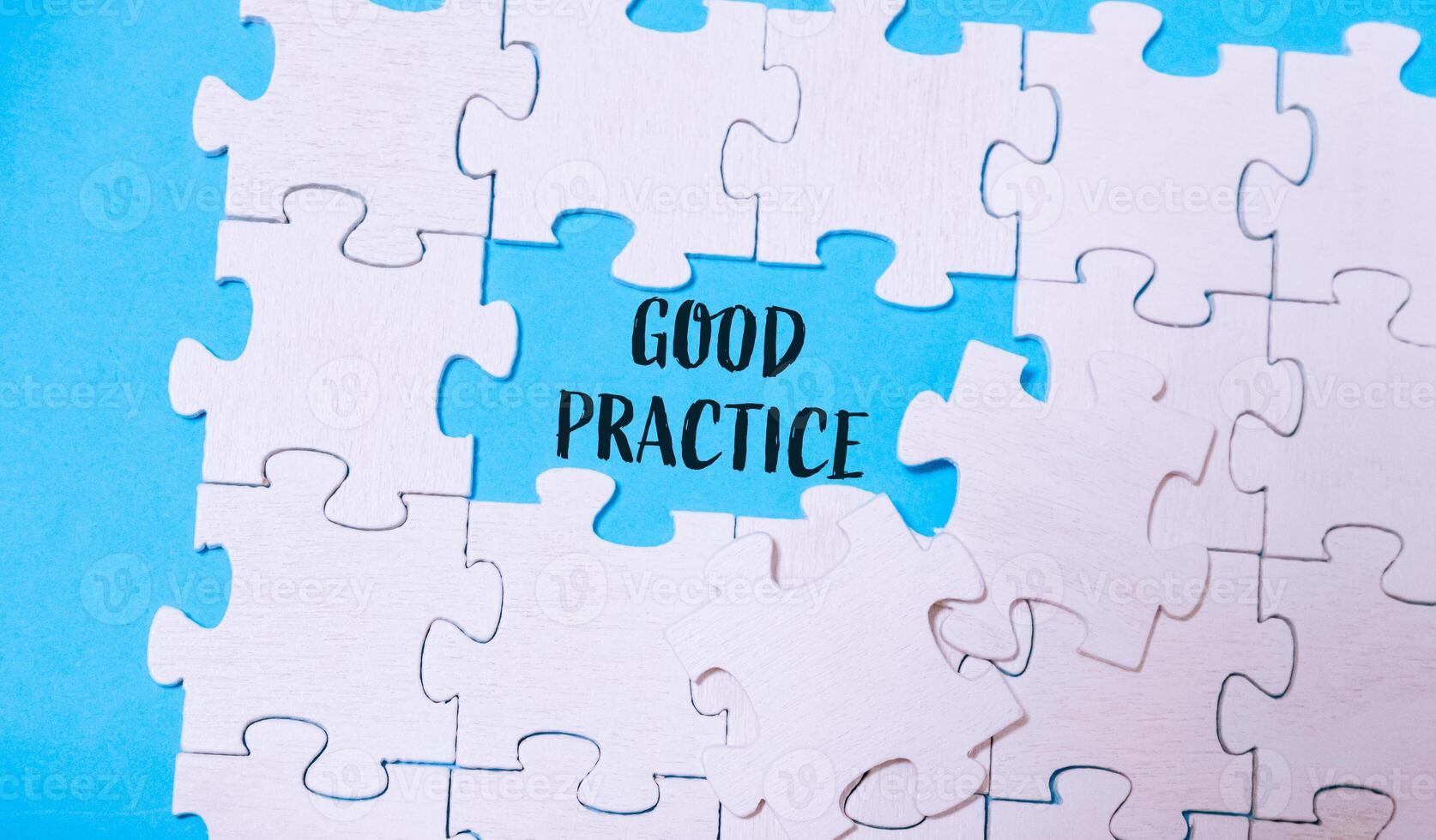 A puzzle with the word good practice written in the middle photo