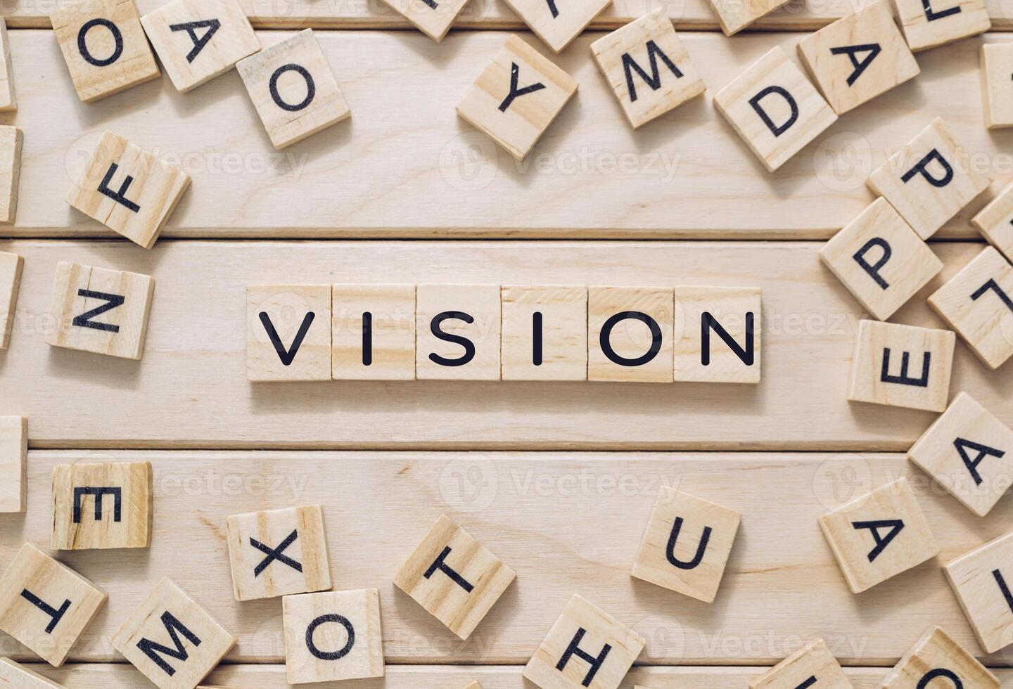 The blocks are scattered around the word, creating a playful photo
