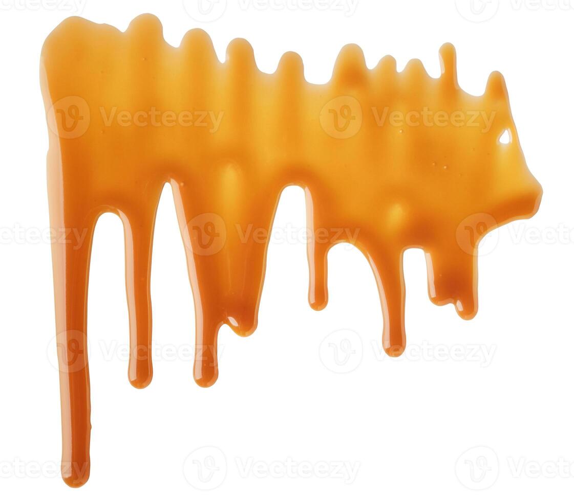 Dripping abstract Melted caramel sauce drops on white background photo