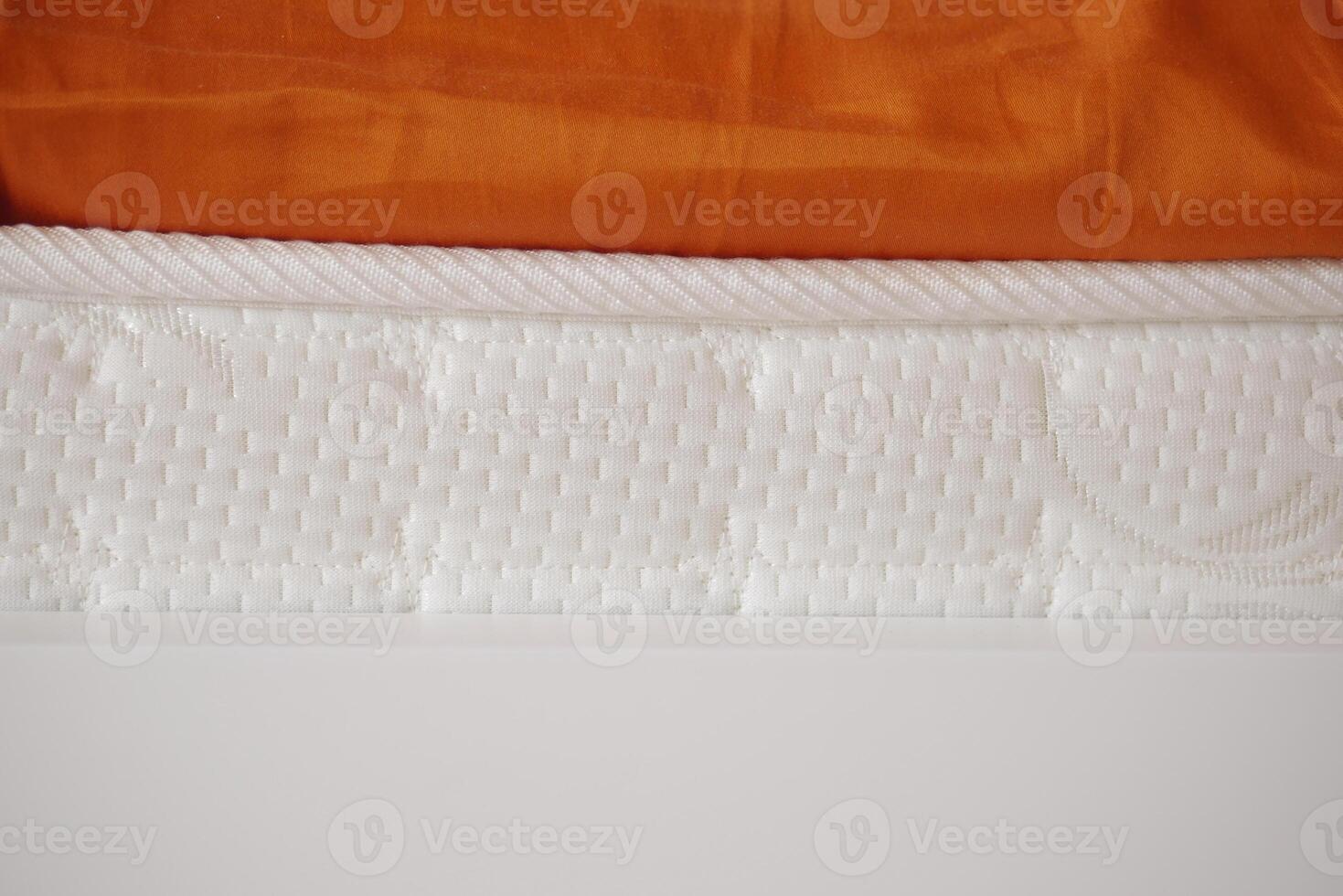Close-up of bedding showing mattress , photo