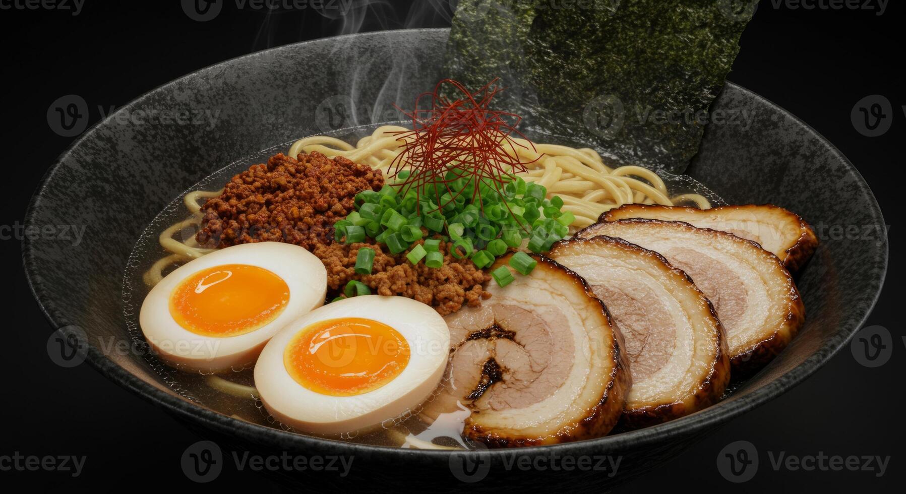 Bowl of Delicious Japanese Ramen Noodles with Pork and Eggs Ready to Eat photo