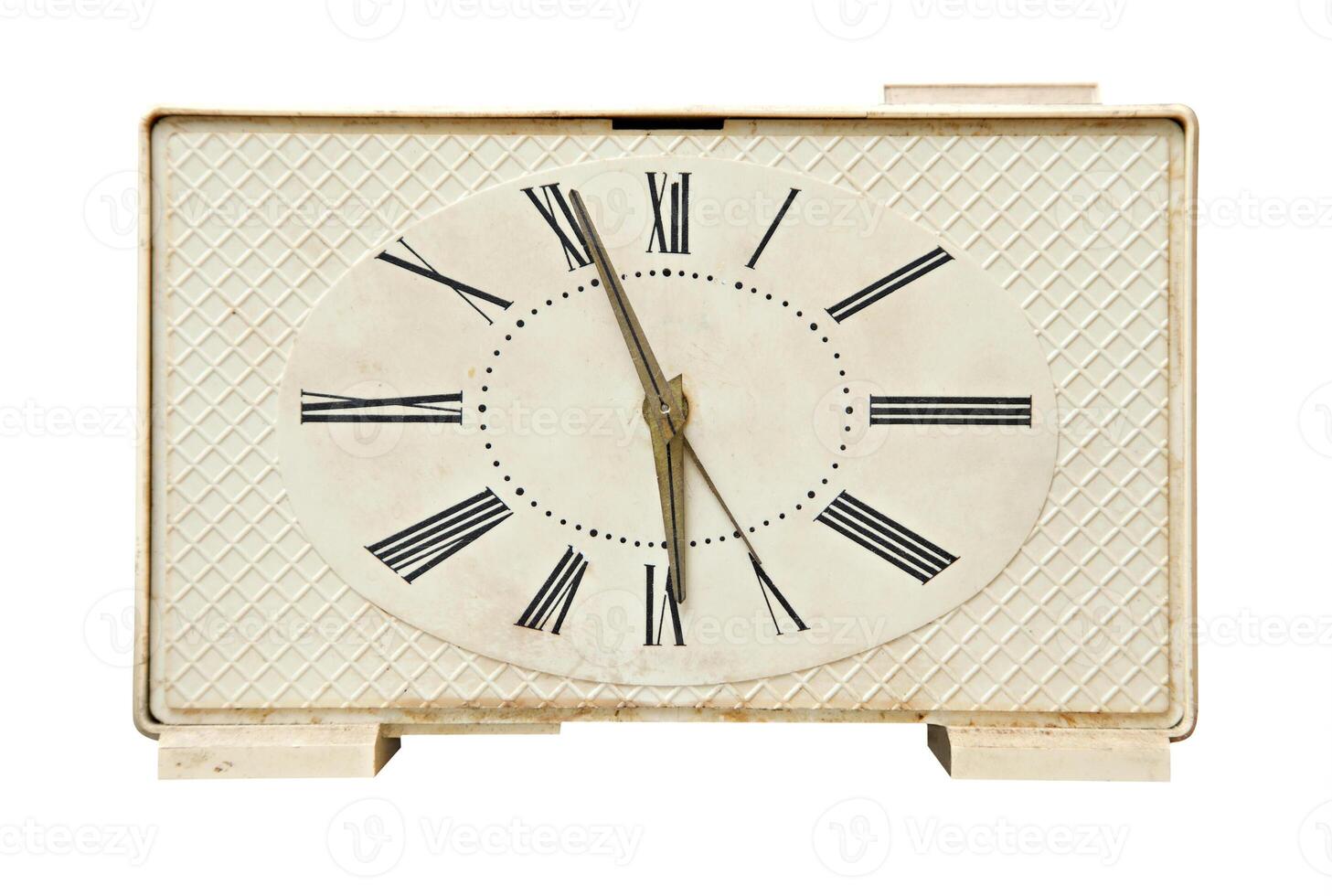 Old alarm clock over white photo