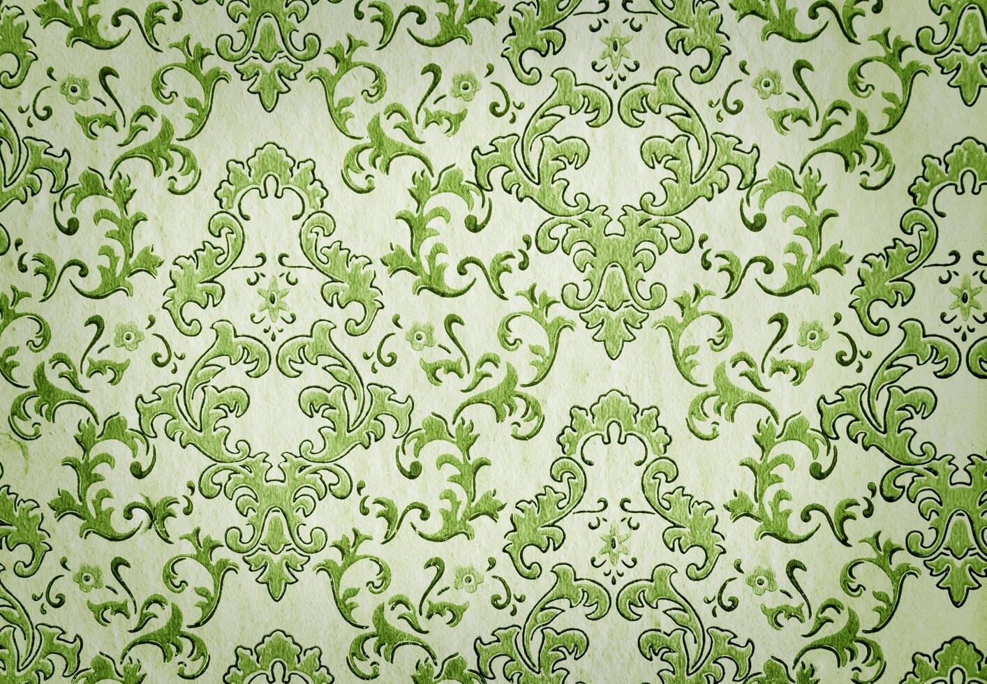 Old green wallpaper with vignette photo