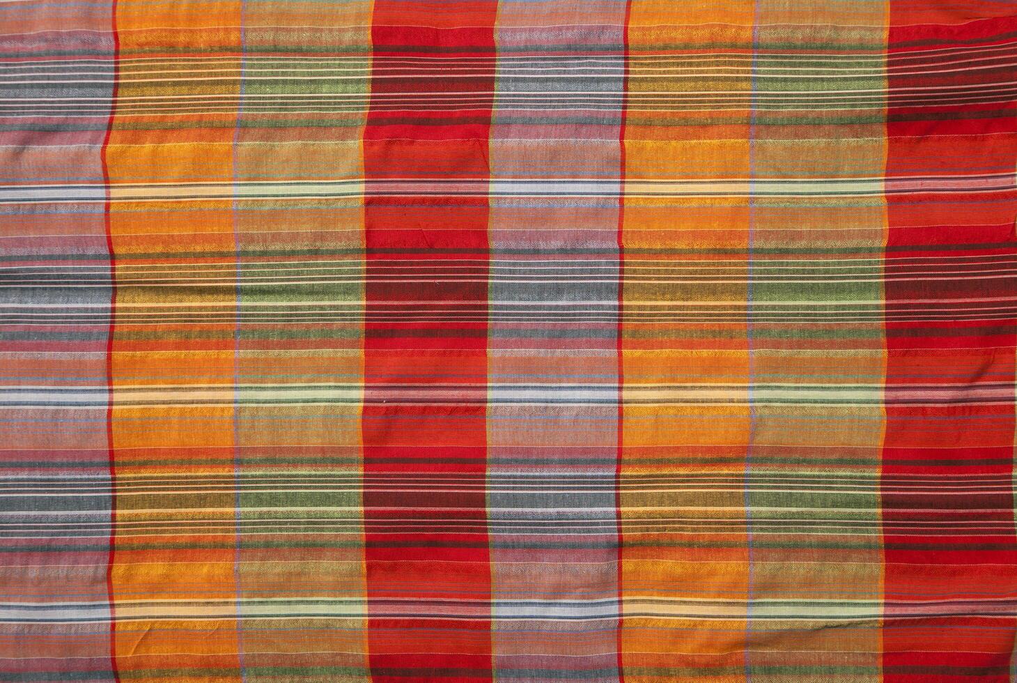Red and orange fabric with geometric pattern photo