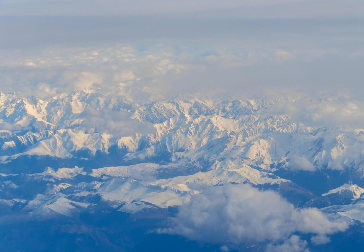 Clouds and blue sky, from airplane photo