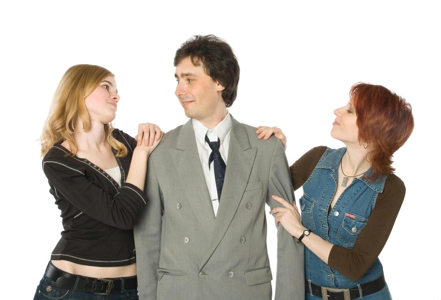 Man choosing between two women photo
