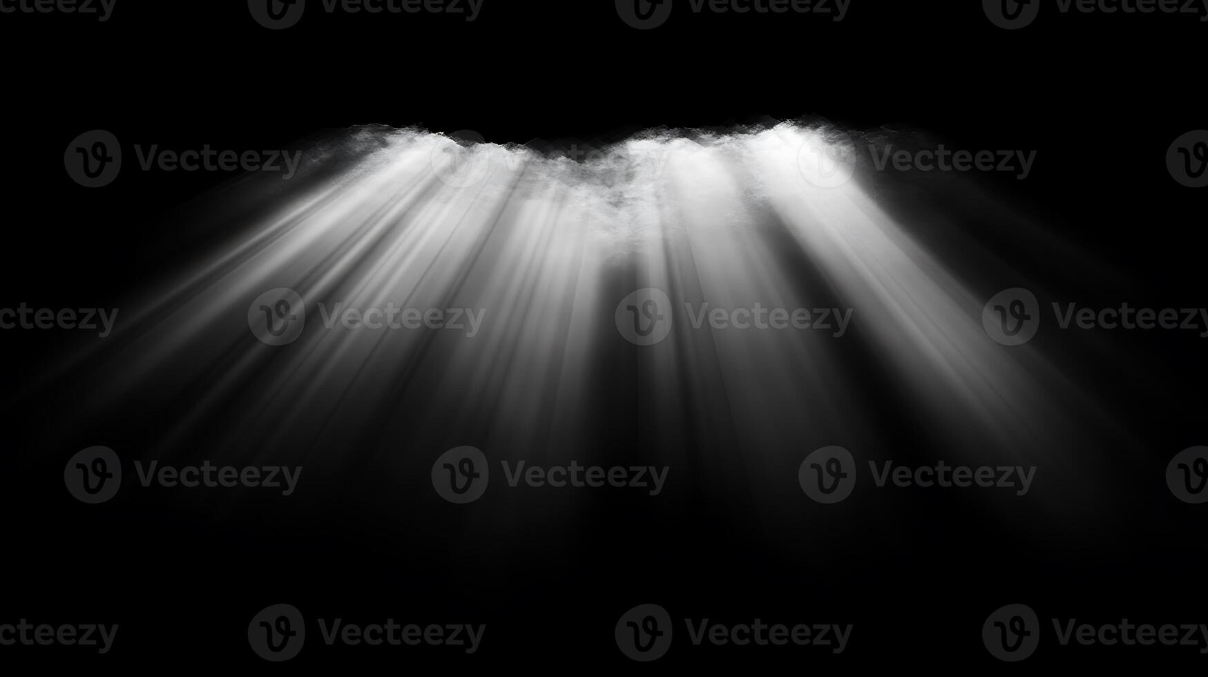 White light beams shining down from above against a dark black background creating a dramatic effect photo