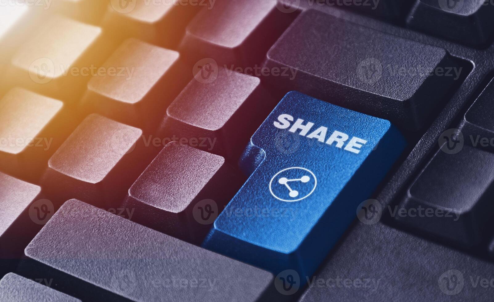 Share Button on Computer Keyboard. Digital Communication and Social Media Concept photo