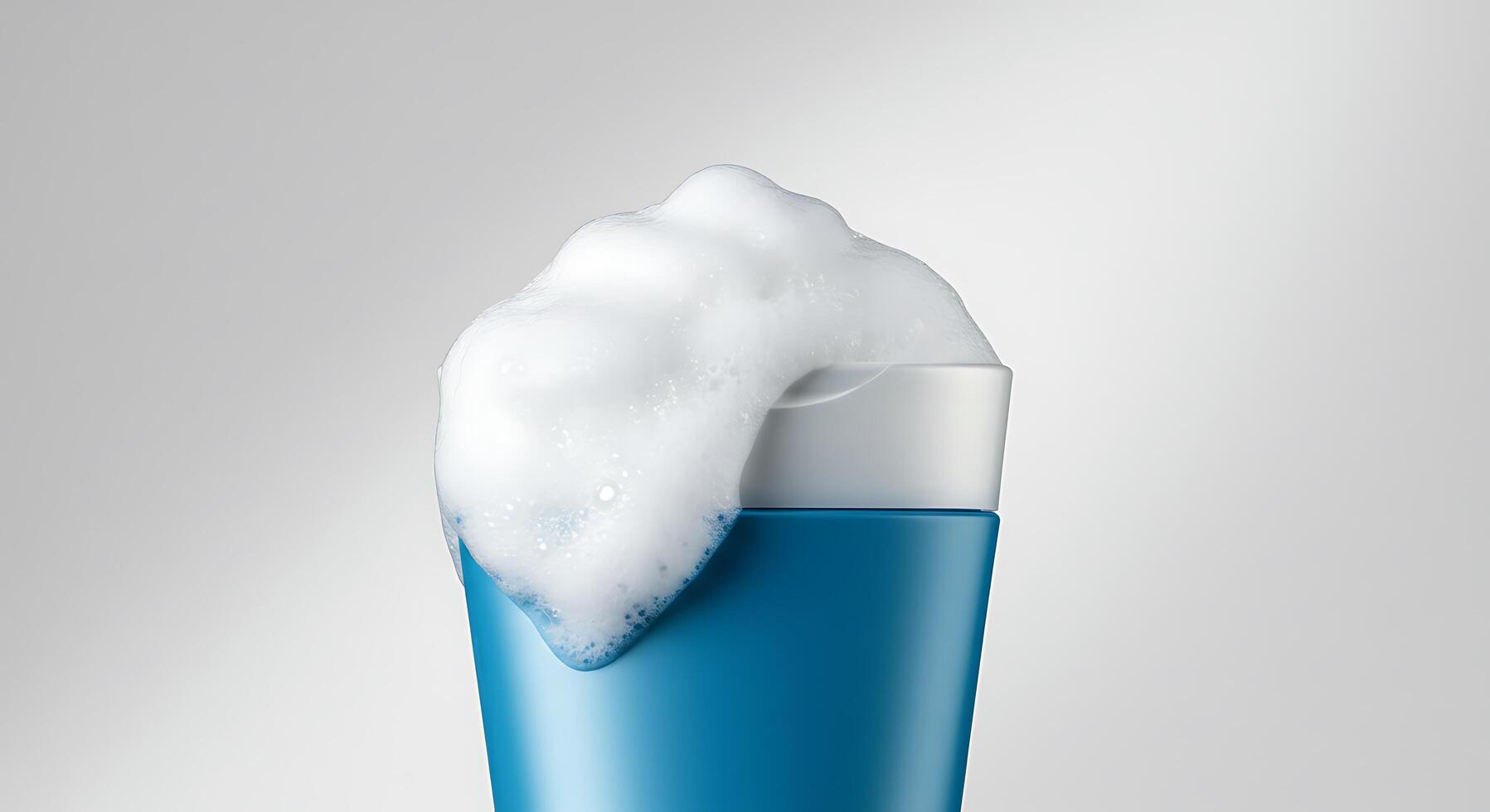 A blue cup with foam on top photo