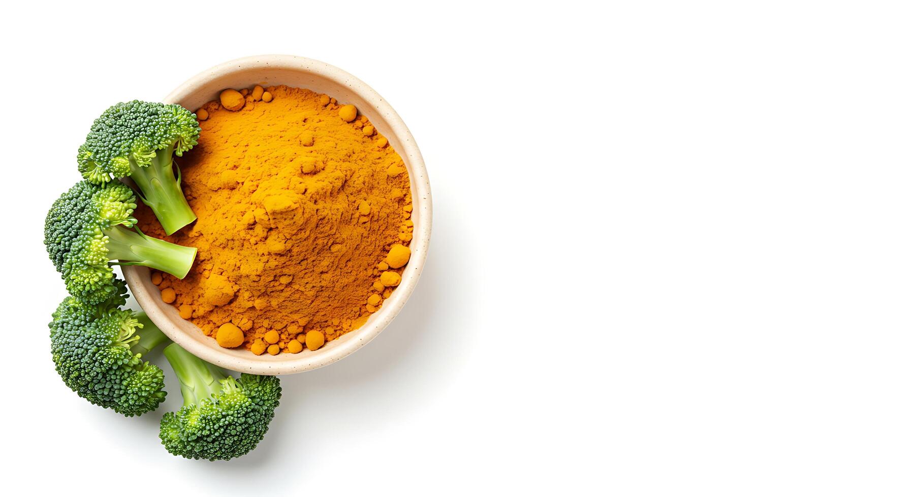 Broccoli and turmeric powder in a bowl photo