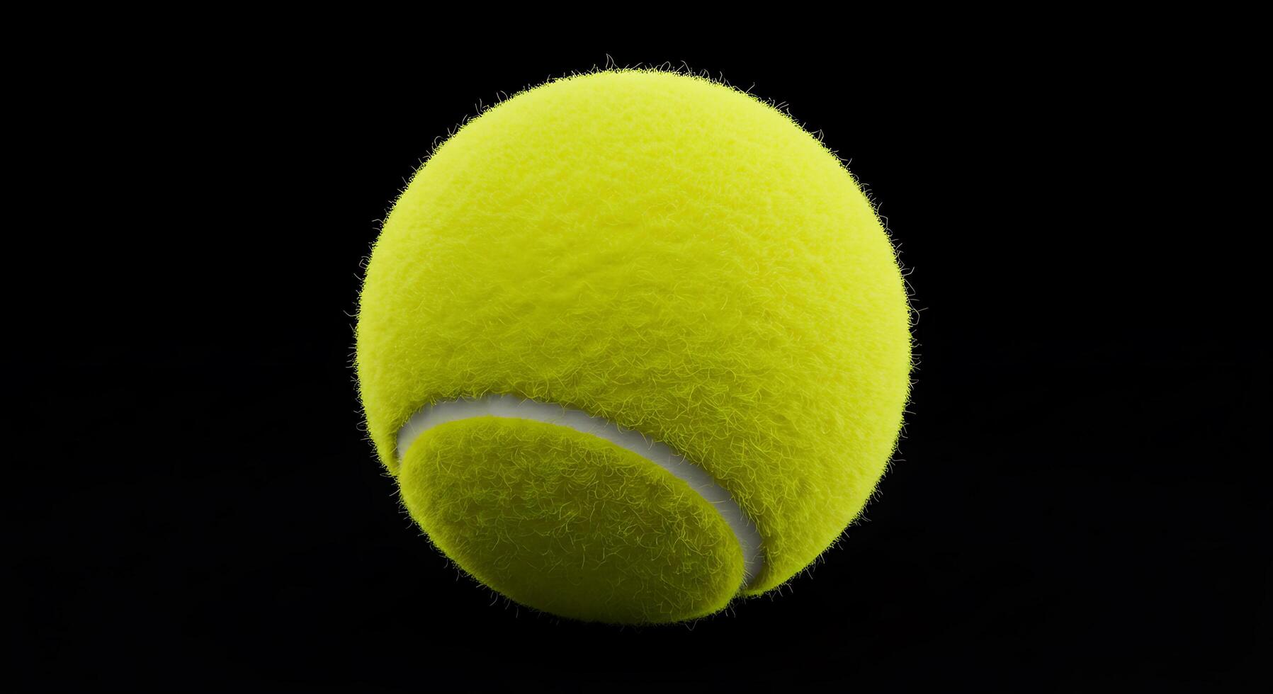 A tennis ball is shown on a black background photo