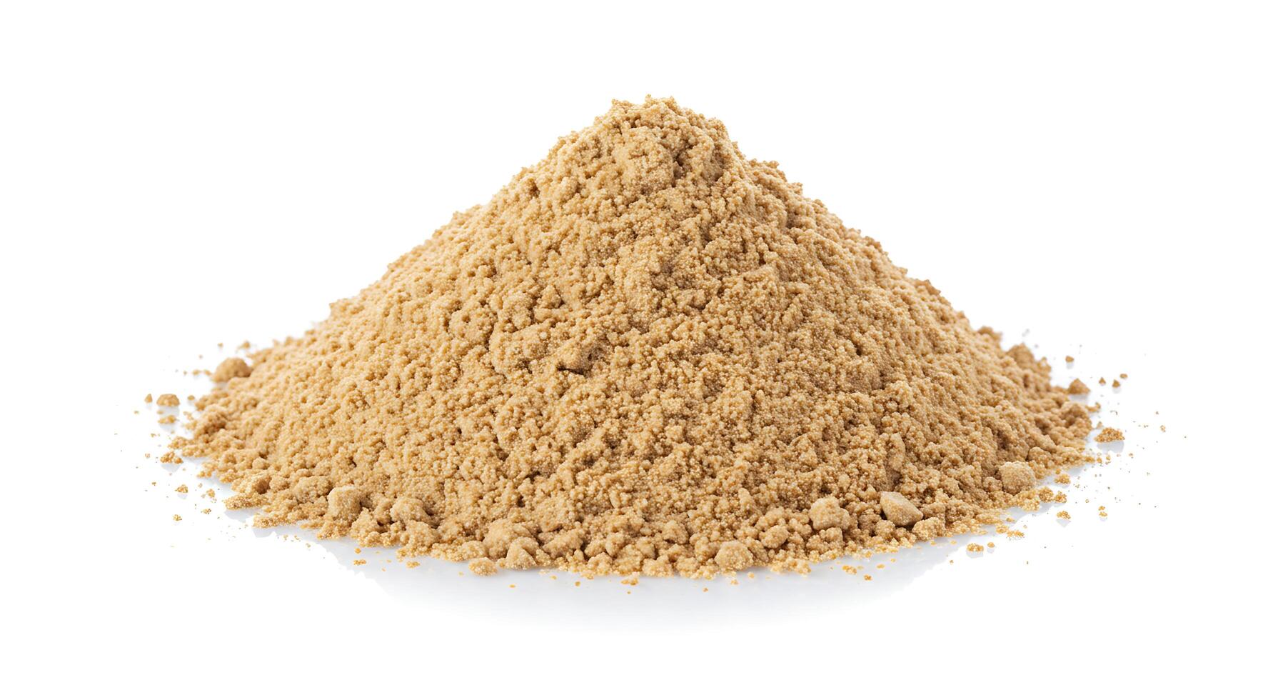 A pile of brown powder on a white background photo