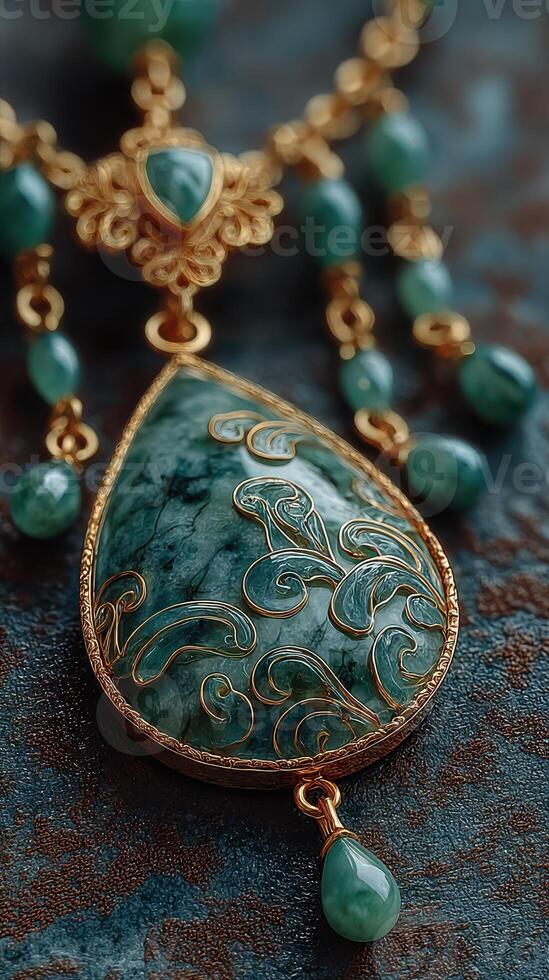 Exquisite emerald pendant adorned with intricate gold filigree resting on textured background photo