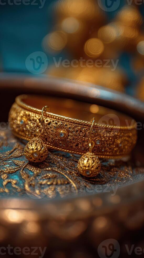 Intricate gold jewelry displayed elegantly on a decorative surface in a vibrant setting photo