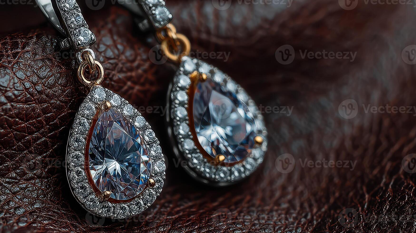 Intricate teardrop earrings featuring brilliant stones and elegant design showcased on a textured background photo