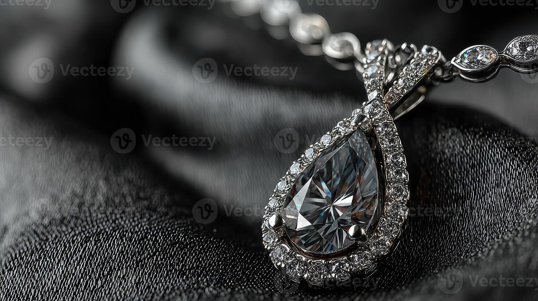 Exquisite diamond pendant necklace displayed on elegant black fabric with intricate details and sparkling stones photo