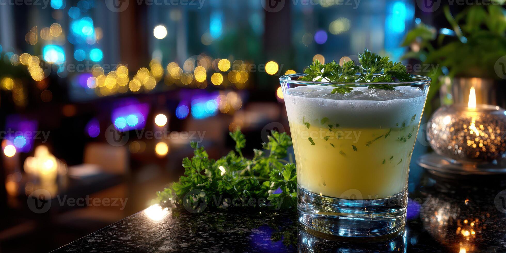 Refreshing cocktail garnished with herbs served in a vibrant bar setting during the evening hours photo