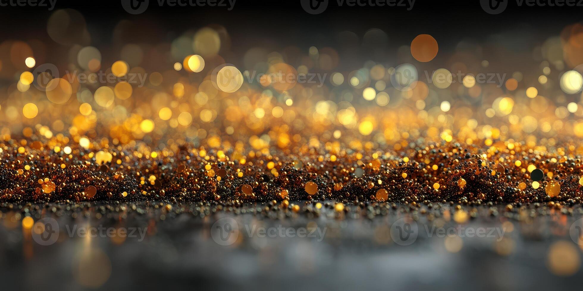 Shimmering golden glitter reflecting light on a dark background creates a festive atmosphere for celebrations and events photo