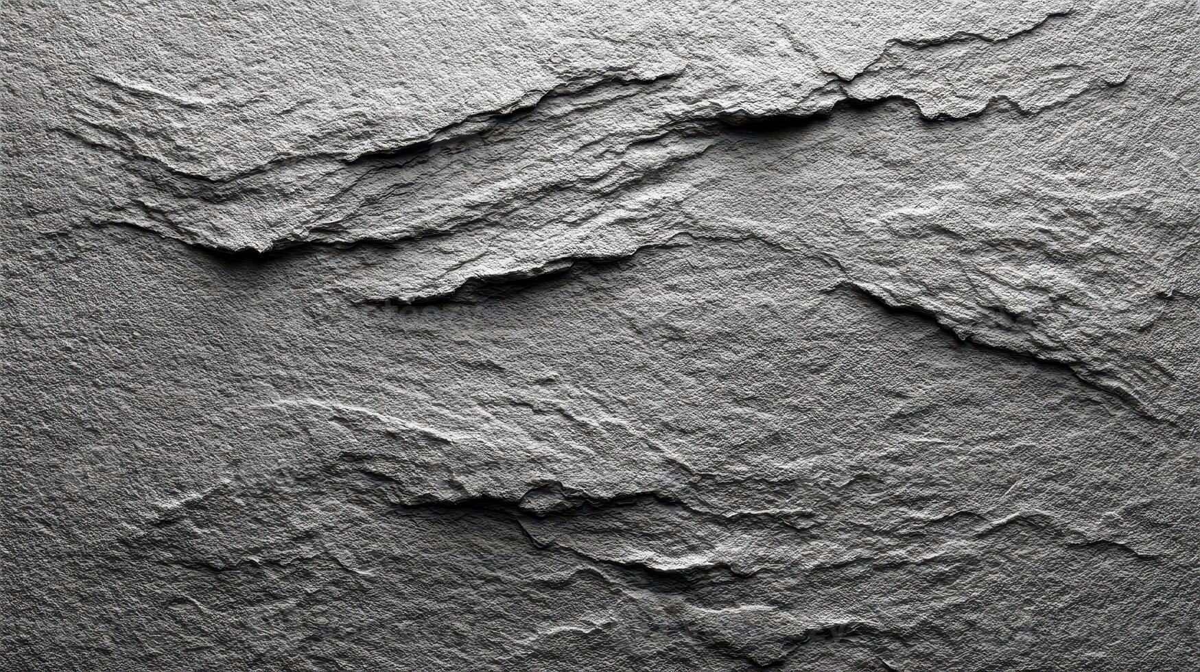 Detailed abstract texture of layered gray rock surface captured under soft lighting in a studio setting photo