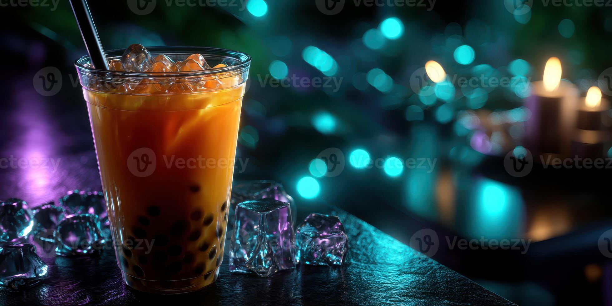 Refreshing iced beverage with tapioca pearls in a cozy setting during the evening photo