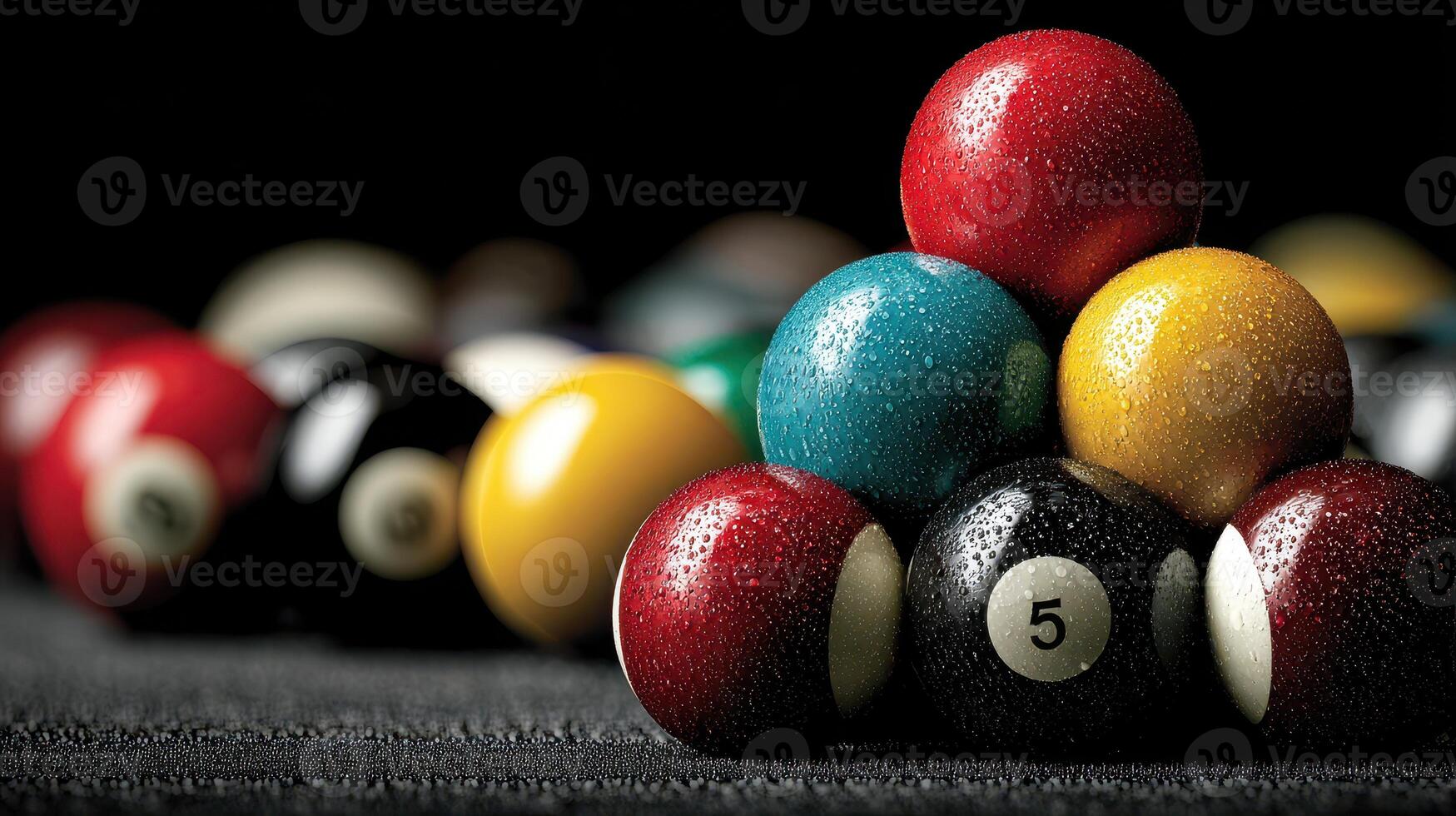 Colorful pool balls arranged in a triangle on a damp table ready for a game at a local bar during the evening hours photo