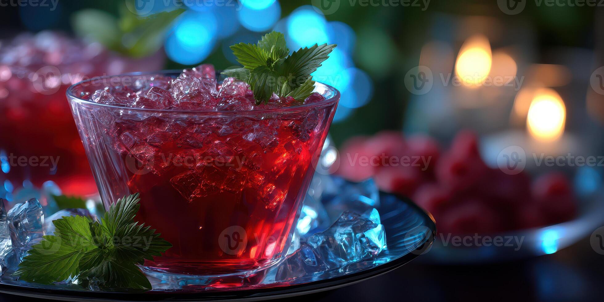Refreshing berry cocktail adorned with fresh mint leaves served in a glass surrounded by ice photo