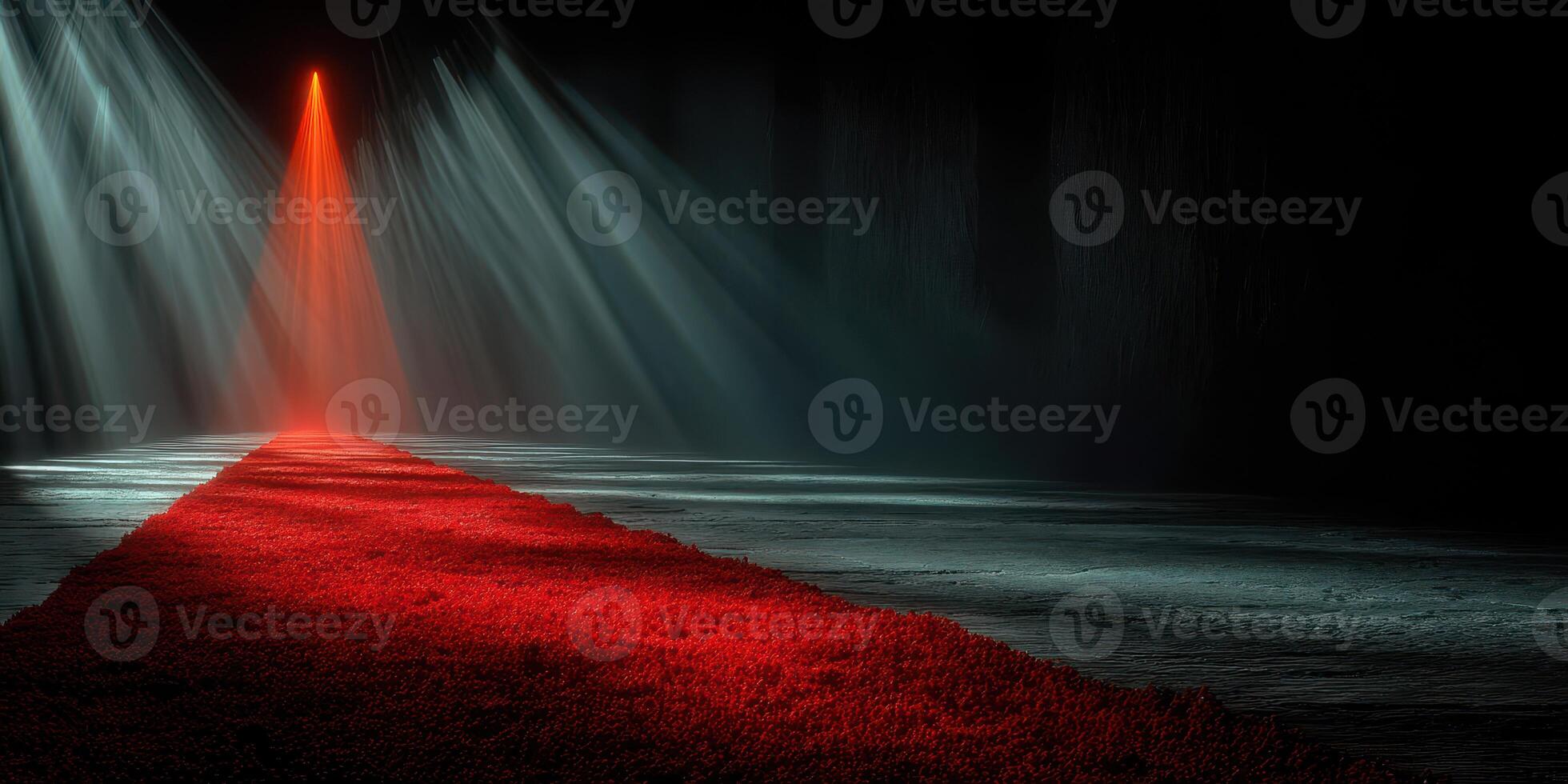 Light beams shine down on a red carpet leading into darkness at an event venue in the evening photo